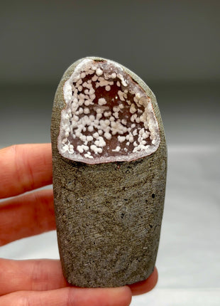 Okenite Snowballs with Red Quartz Geode