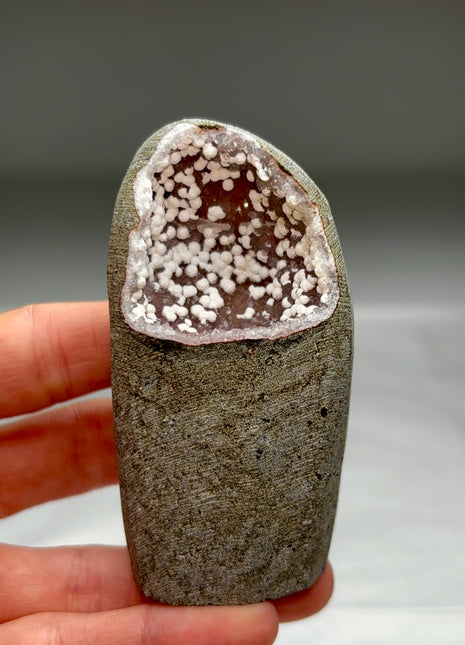 Okenite Snowballs with Red Quartz Geode