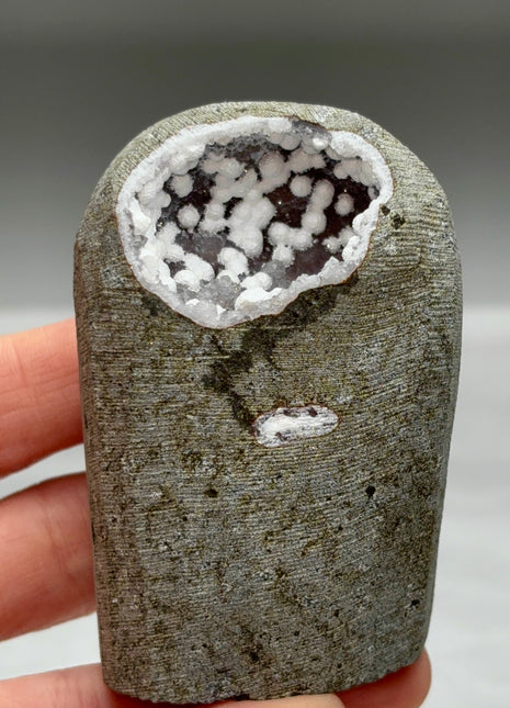 Okenite Snowballs with Red Quartz Geode
