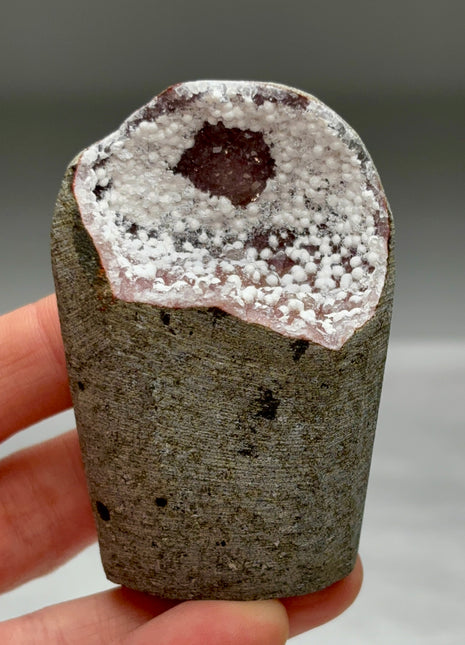 Okenite Snowballs with Red Quartz Geode