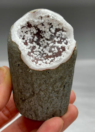 Okenite Snowballs with Red Quartz Geode
